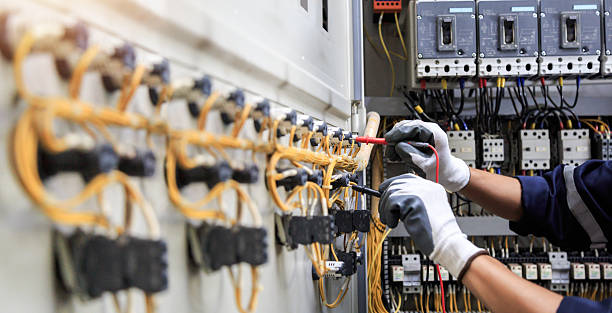 Professional Electrician technician working in Melville, RI